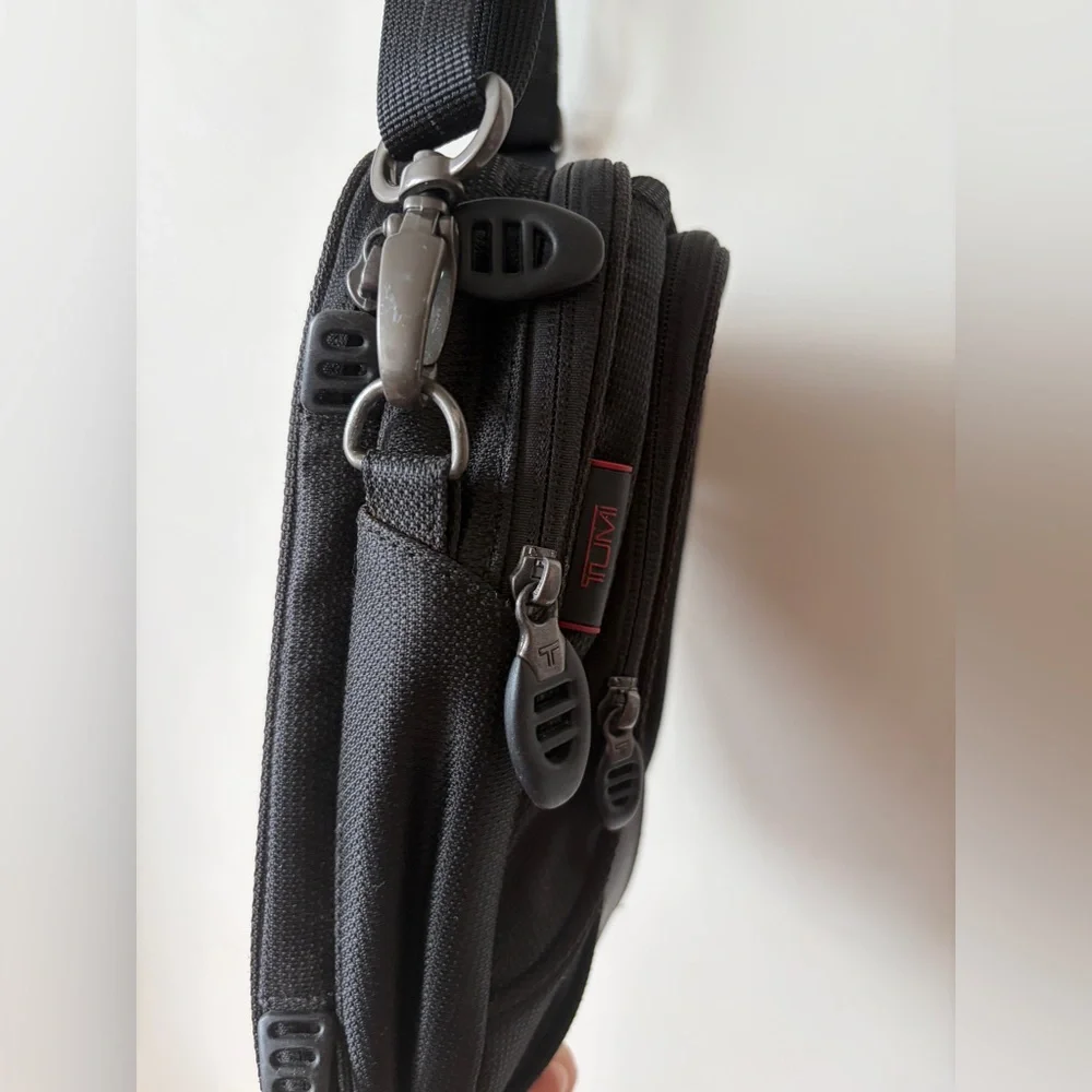 Tumi T-Tech sling bag with multiple compartments and Keychain mens